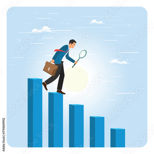 Financial downturn concept, businessman analyze declining bar graph and chart.
