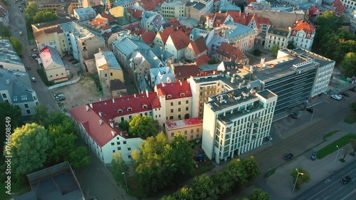Riga, Latvia, Baltics. Beautiful panoramic aerial 4K video from flying drone to old Riga city on a summer sunset. (Series)