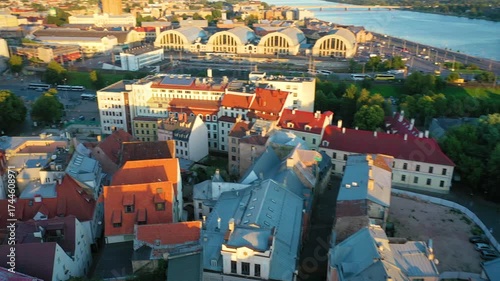 Riga, Latvia, Baltics. Beautiful panoramic aerial 4K video from flying drone to old Riga city on a summer sunset. (Series)