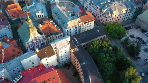 Riga, Latvia, Baltics. Beautiful panoramic aerial 4K video from flying drone to old Riga city on a summer sunset. (Series)