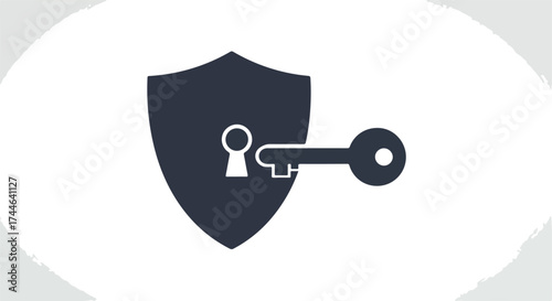 Security shield with key representing protection and access control concept.