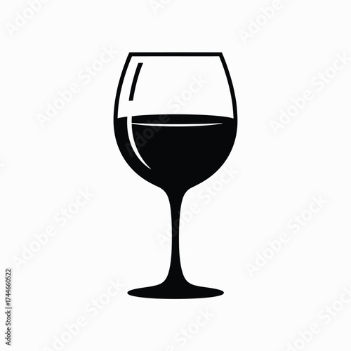 Black silhouette of a wine glass filled with dark liquid drink