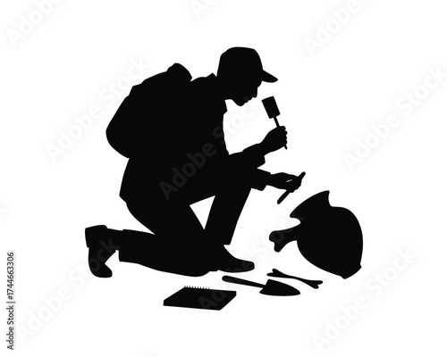 Black silhouette of archaeologist examining artifact with tools white kneeling