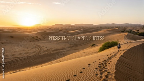 Fototapeta Naklejka Na Ścianę i Meble -  Sunrise in Desert Landscape with Hiker Walking on Sand Dunes, Inspiring Message on Persistence and Success