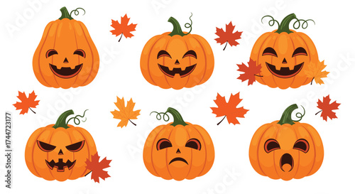 A collection of carved halloween pumpkins with various expressions surrounded by autumn leaves.