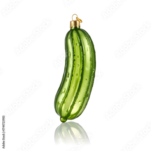 Festive glass cucumber ornament on white background, holiday decoration