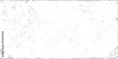 Vintage white grunge paper background with a rough textured surface and dirty paint pattern