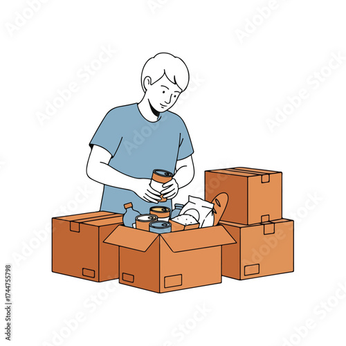 Volunteer sorting various food items into cardboard boxes