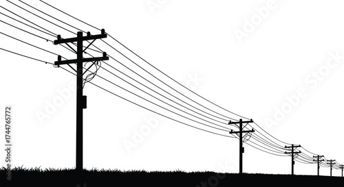 Black silhouette of electric poles and power lines over grassy ground showing energy transmission and rural electricity distribution network
