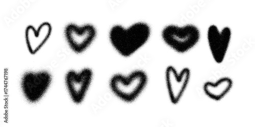 Set of graffiti hearts in stipple art style with spray texture and grain shading. Abstract vector hearts in black and white. Stipple art graffiti elements for street art, poster