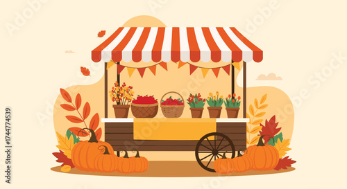 Autumn harvest festival stand with pumpkins and colorful leaves.