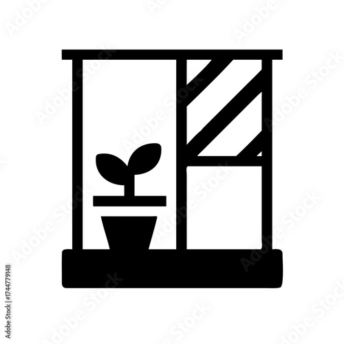 Potted plant in a window representing nature indoors