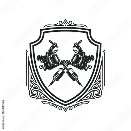 Crossed Tattoo Machines in Ornate Shield Emblem.