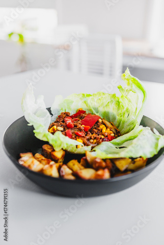 healthy lettuce san choy bow with roasted potato wedges, homemade diabetes friendly meal