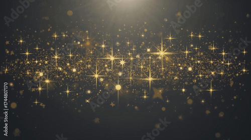 A mesmerizing display of golden particles and sparkling stars against a dark backdrop, creating a captivating and elegant visual effect.