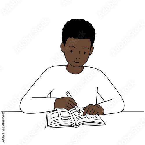Black teenage boy highlighting text in a textbook while studying  