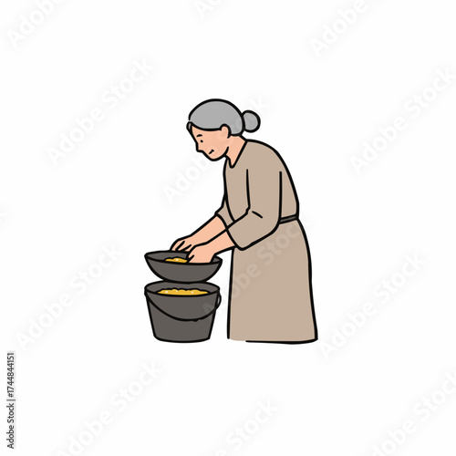 Elderly woman sifting grains into a bowl while standing in kitchen  