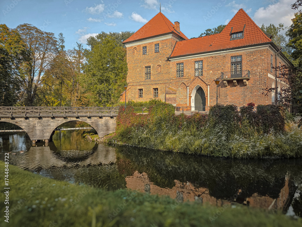 Fototapeta premium A brick Gothic castle in Oporow, Poland
