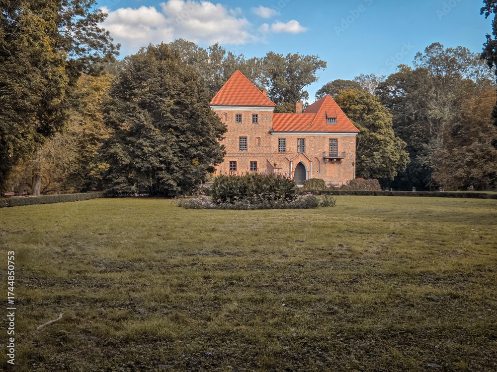 Obraz premium A brick Gothic castle in Oporow, Poland