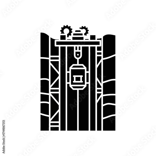 Industrial mining elevator shaft with gears and lifting mechanism.