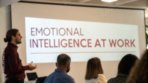 Presenter Discusses the Importance of Emotional Intelligence in Professional Work Environment During Workshop