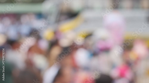Wallpaper Mural A blurry image of a crowd of people with a yellow background Torontodigital.ca