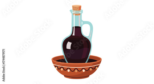 A vintage glass bottle with a cork stopper filled with dark liquid and sitting in a rustic clay bowl.