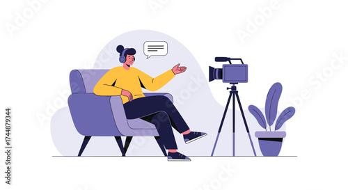 A person sitting in a chair and speaking to a camera.