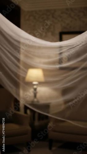 Elegant Room with Lamp and Sheer Fabric - A Serene Ambiance.