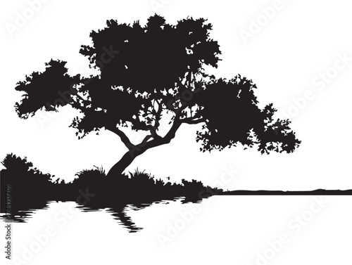 Serene Isolated Tree By A Peaceful Lake Silhouette