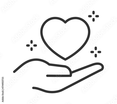 Heart care: hand with heart and sparkles icon
