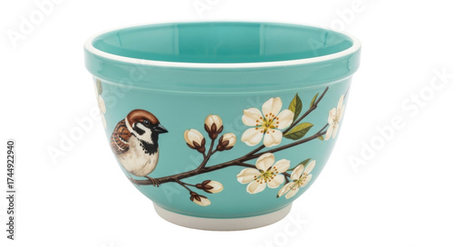 Fotografia Isolated turquoise bowl featuring bird and flowering branch, spring kitchenware