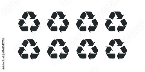 Eight Black Recycling Symbols Arranged in Two Rows