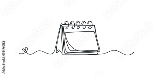 Desk calendar with spiral binding on white background