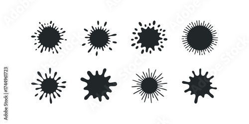 Collection of eight black ink splatters and drops
