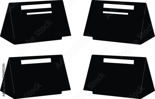 Vector art of four black table tent cards, commonly used for displaying information, promotions, or names at events and gatherings