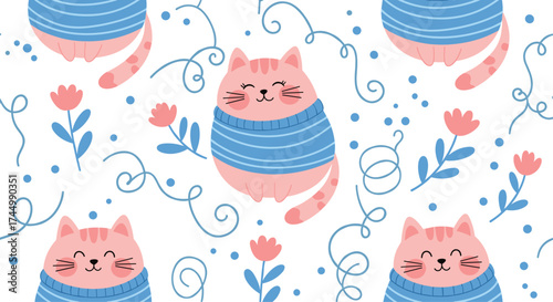 Cute cartoon cats wearing blue sweaters surrounded by flowers and swirls.