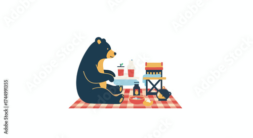 A black bear enjoying a picnic lunch on a checkered blanket.