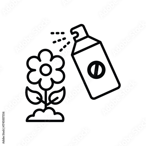 Spraying a flower with a pesticide spray can