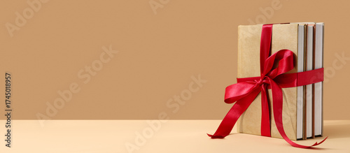 Stack of books with red rib...
