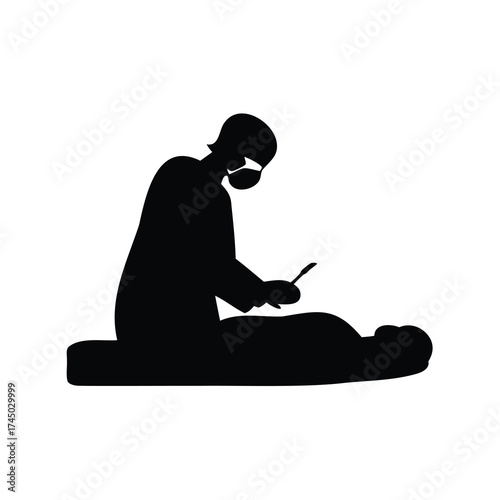 Surgical procedure in progress with masked surgeon holding a scalpel