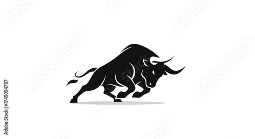 Powerful black bull silhouette charging forward on white background.