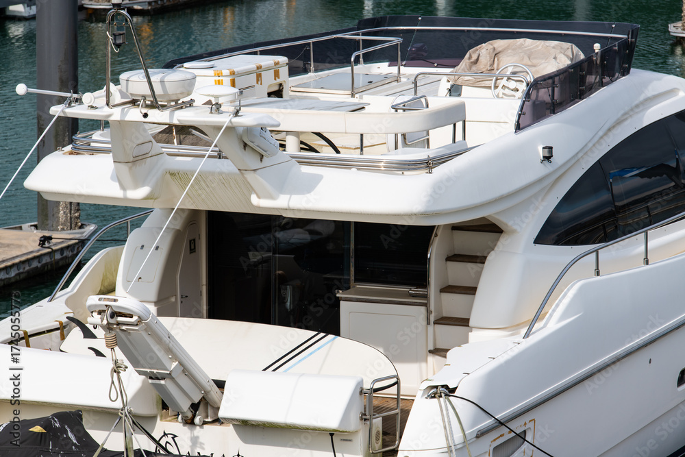 Fototapeta premium view of a boat moored at the marina