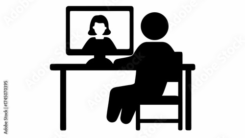 Person sitting at desk with computer showing another person in a video call conference meeting online