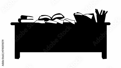 Silhouette of a desk with books and papers scattered on top and a pen holder on the right corner