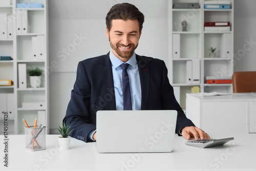 Young male secretary workin...