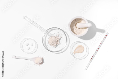 Petri dish with powder and ...