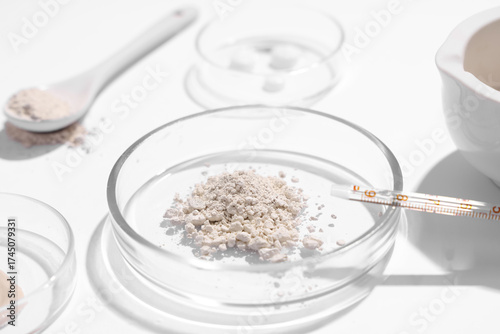 Petri dish with powder and ...
