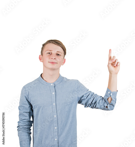 Contented male teenager pointing up his forefinger as looks confident to camera. Positive adolescent guy portrait isolated on transparent background
