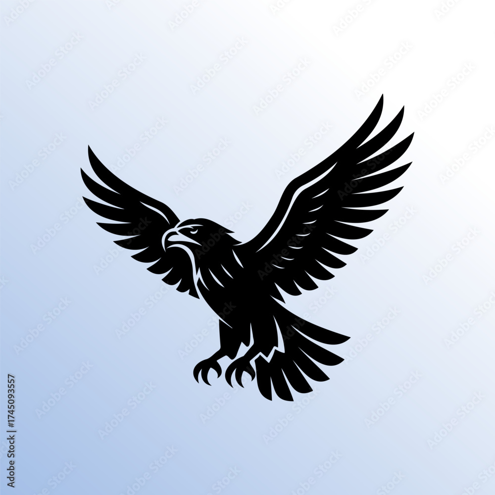 Obraz premium Silhouette of flying eagle with spread wings on blue gradient background